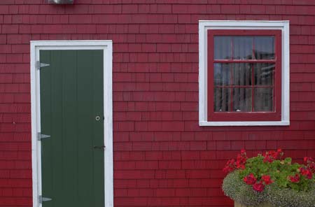 {red house and flowers