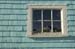 {building reflection in window